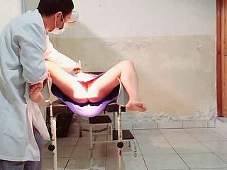 The contaminate performs a gynecological interrogation at bottom a female patient he puts his finger in the matter of her vagina with the addition of gets stirred up